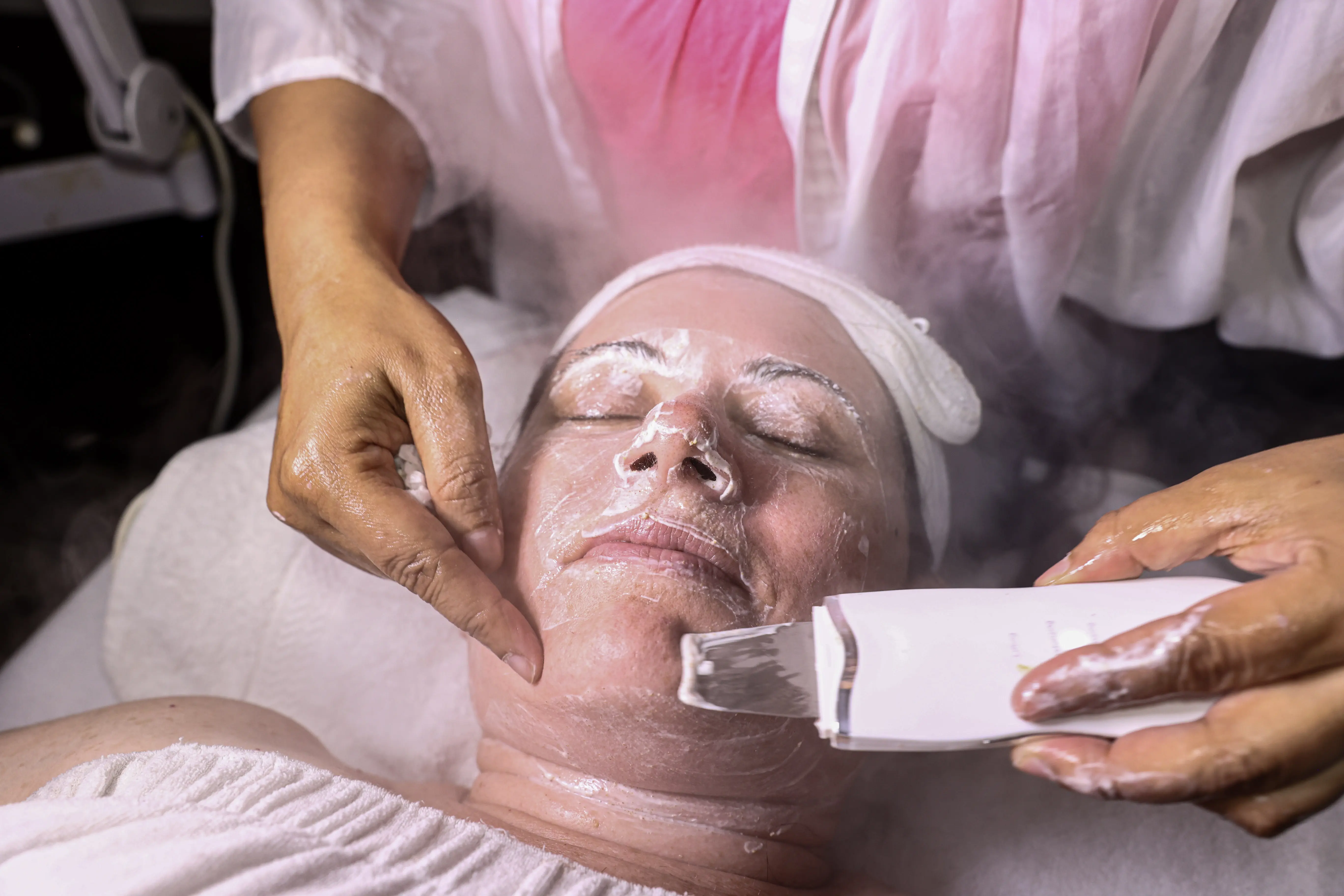 Facial skincare tool used during a treatment